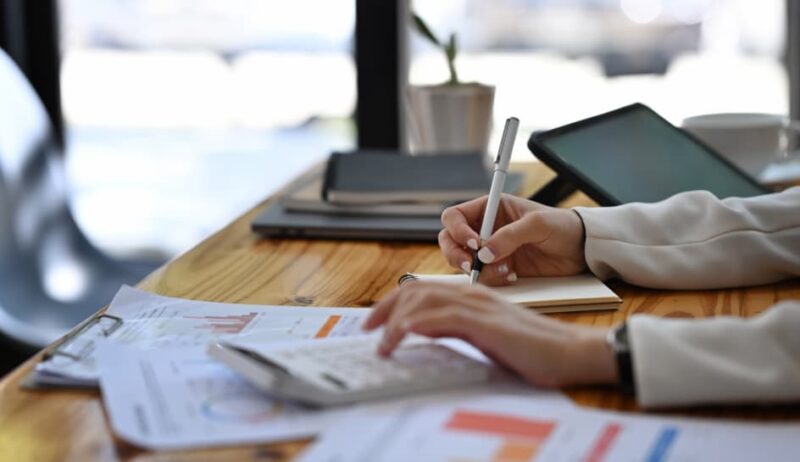 close-up-view-businesswoman-writing-information-on-2024-11-30-03-43-53-utc close-up-view-businesswoman-writing-information-on-2024-11-30-03-43-53-utc